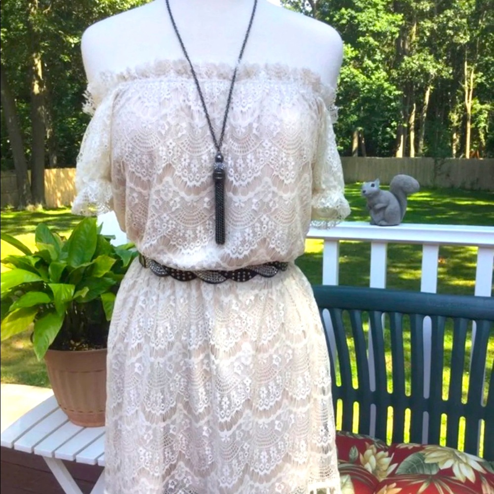Adorable Vintage style lace dress with tasseled bottom. (Small)